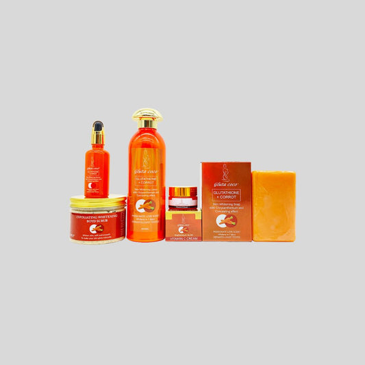 Skincare Set designed to remove dark spots, combat aging, and restore a glowing complexion with natural ingredients like carrot oil and Vitamin C, suitable for all skin types.